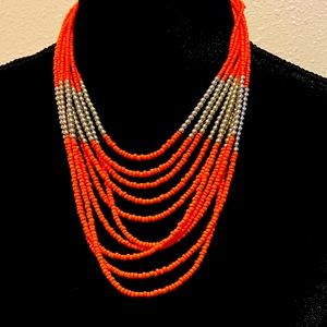 Beaded orange necklace and bracelet